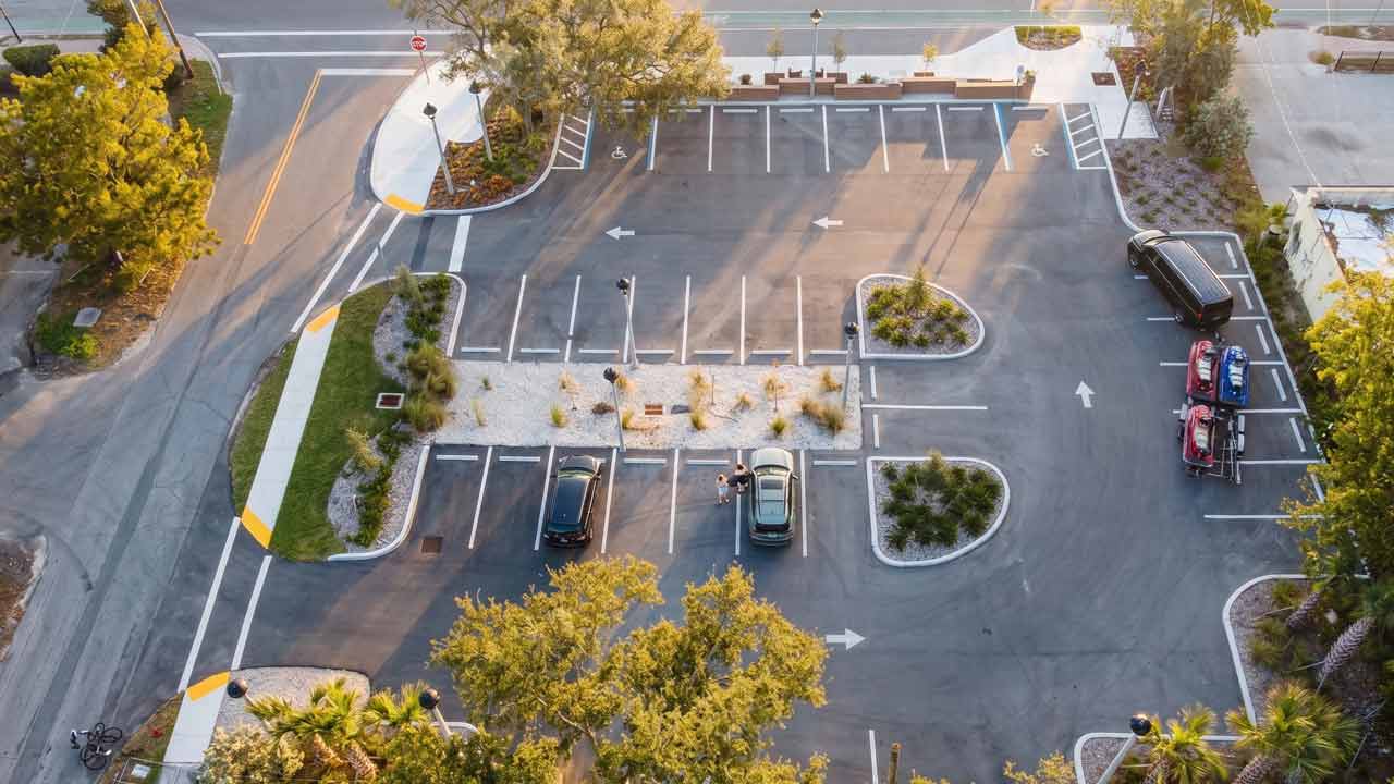 Bayshore Gateway public parking lot with drainage, lighting, and landscaping built by Fort Construction for the Collier County Bayshore Gateway Triangle CRA