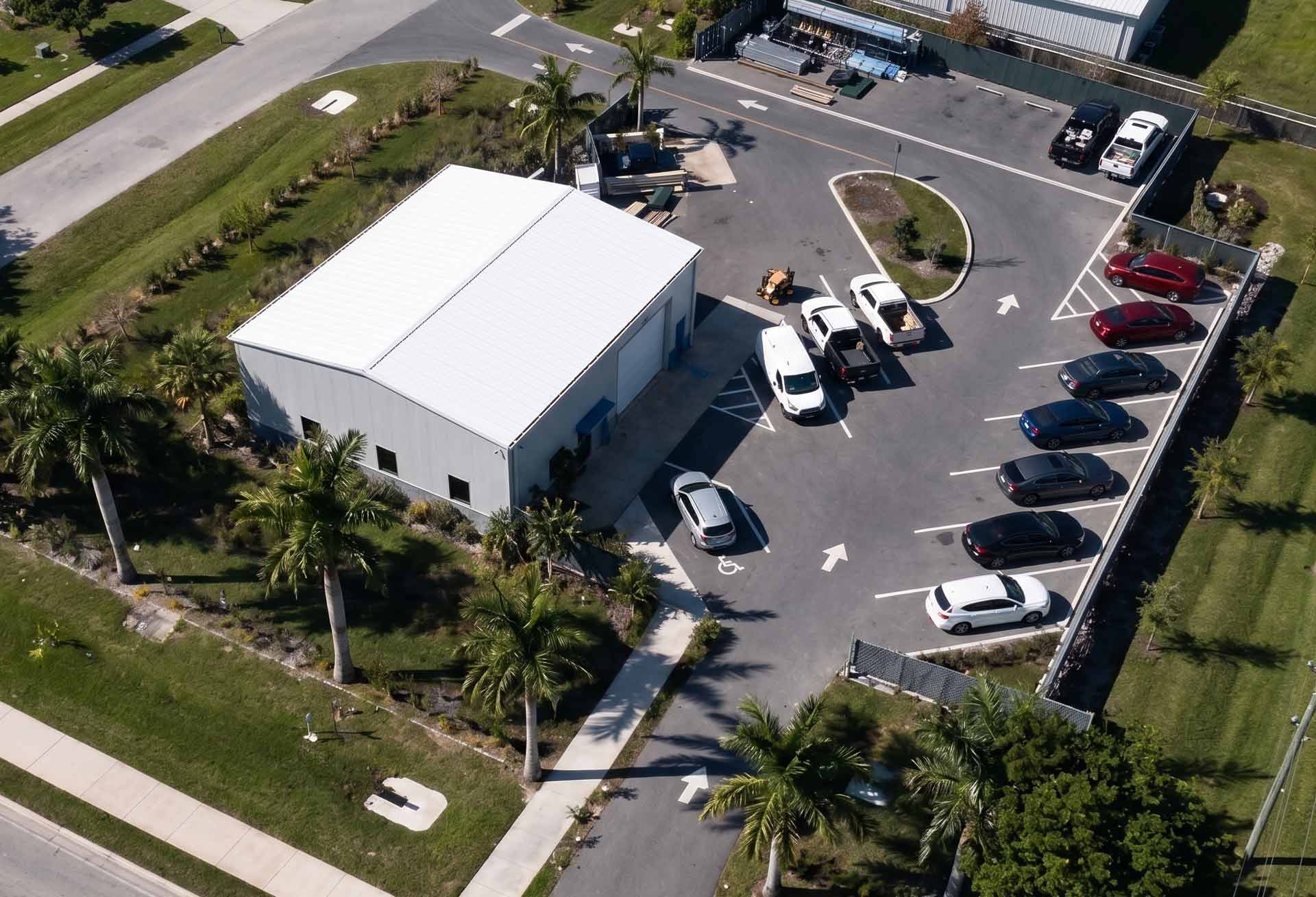 Collier Seawall & Dock warehouse building in Naples, Florida, permitted and constructed by Fort Construction