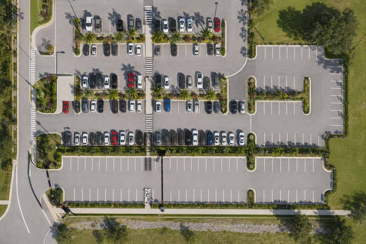 Naples Airport parking lot expansion with stormwater infrastructure and landscaping built by Fort Construction for the City of Naples Airport Authority
